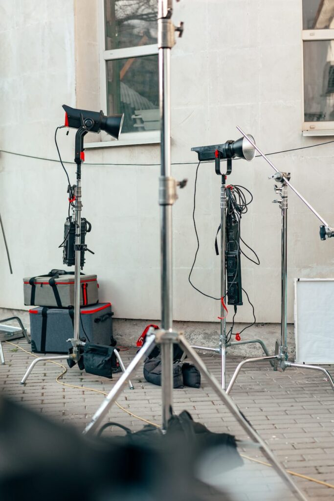 Filming equipment stading outside a building